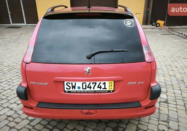 Червоний Пежо 206, об'ємом двигуна 1.4 л та пробігом 286 тис. км за 4250 $, фото 6 на Automoto.ua