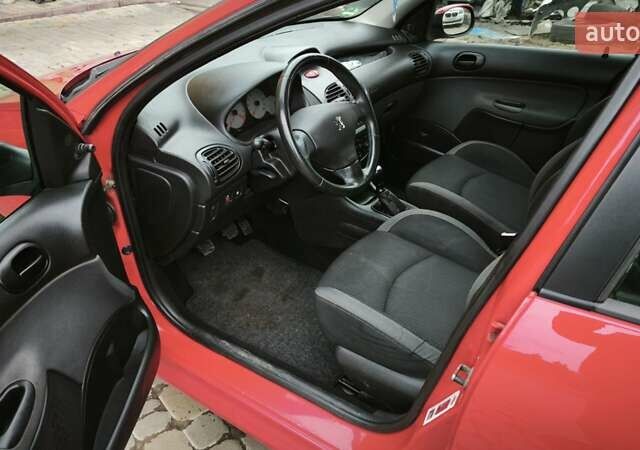 Червоний Пежо 206, об'ємом двигуна 1.4 л та пробігом 286 тис. км за 4250 $, фото 32 на Automoto.ua