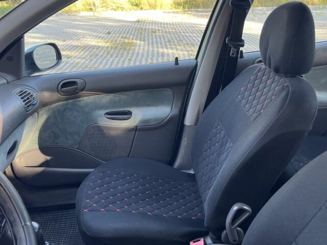 Пежо 206, объемом двигателя 1.6 л и пробегом 100 тыс. км за 1600 $, фото 5 на Automoto.ua
