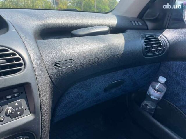 Пежо 206, объемом двигателя 1.6 л и пробегом 108 тыс. км за 4499 $, фото 17 на Automoto.ua