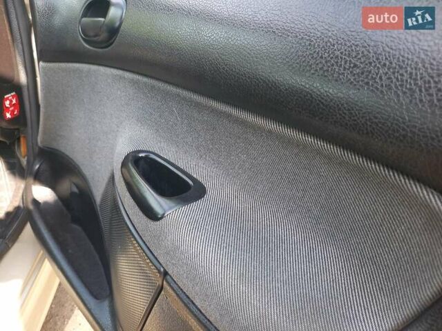 Пежо 206, объемом двигателя 1.4 л и пробегом 231 тыс. км за 3450 $, фото 16 на Automoto.ua