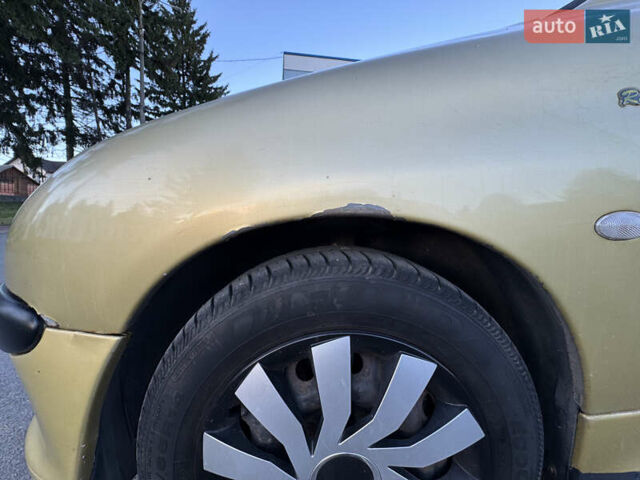 Желтый Пежо 206, объемом двигателя 1.12 л и пробегом 181 тыс. км за 2500 $, фото 9 на Automoto.ua