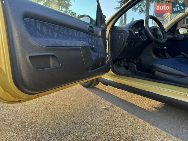 Желтый Пежо 206, объемом двигателя 1.12 л и пробегом 181 тыс. км за 2500 $, фото 13 на Automoto.ua