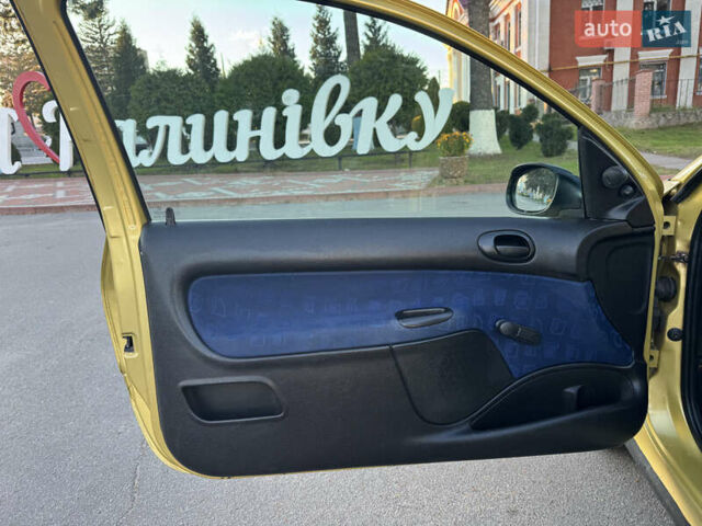 Желтый Пежо 206, объемом двигателя 1.12 л и пробегом 181 тыс. км за 2500 $, фото 18 на Automoto.ua