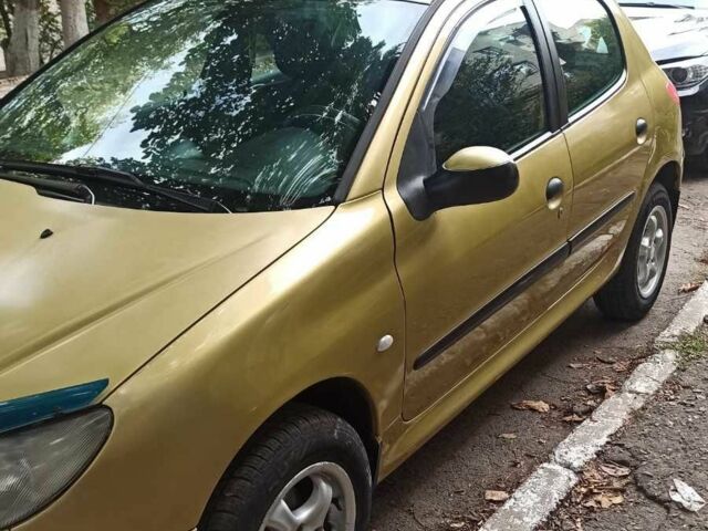 Жовтий Пежо 206, об'ємом двигуна 1.4 л та пробігом 315 тис. км за 2700 $, фото 1 на Automoto.ua