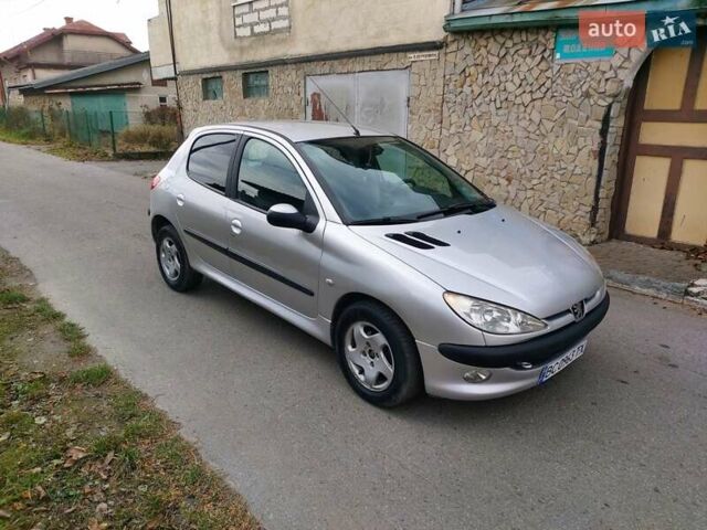 Серый Пежо 206, объемом двигателя 1.39 л и пробегом 289 тыс. км за 2450 $, фото 4 на Automoto.ua