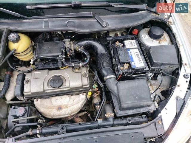 Серый Пежо 206, объемом двигателя 1.39 л и пробегом 289 тыс. км за 2450 $, фото 29 на Automoto.ua