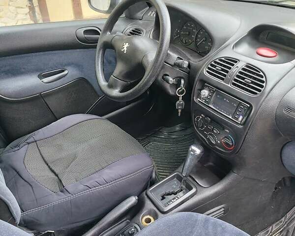 Серый Пежо 206, объемом двигателя 1.39 л и пробегом 289 тыс. км за 2550 $, фото 22 на Automoto.ua