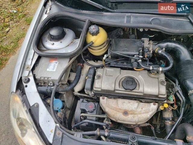 Серый Пежо 206, объемом двигателя 1.39 л и пробегом 289 тыс. км за 2550 $, фото 31 на Automoto.ua