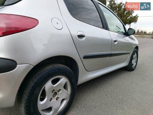 Серый Пежо 206, объемом двигателя 1.39 л и пробегом 289 тыс. км за 2550 $, фото 10 на Automoto.ua