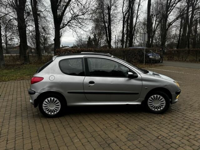 Серый Пежо 206, объемом двигателя 2 л и пробегом 200 тыс. км за 1350 $, фото 5 на Automoto.ua