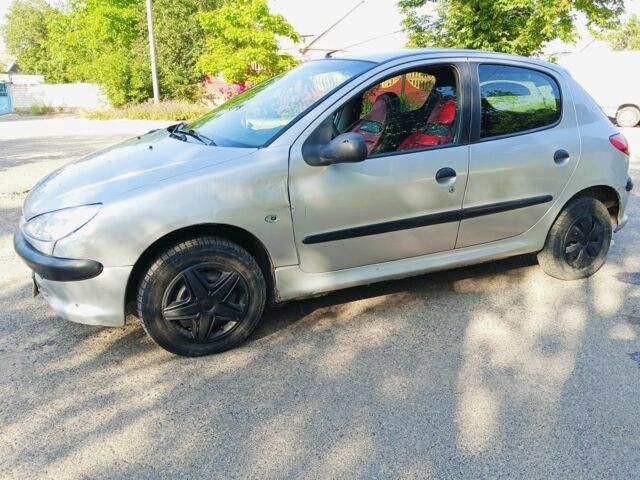 Серый Пежо 206, объемом двигателя 0 л и пробегом 196 тыс. км за 1258 $, фото 3 на Automoto.ua