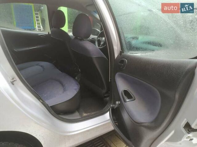 Сірий Пежо 206, об'ємом двигуна 1.36 л та пробігом 340 тис. км за 2950 $, фото 25 на Automoto.ua
