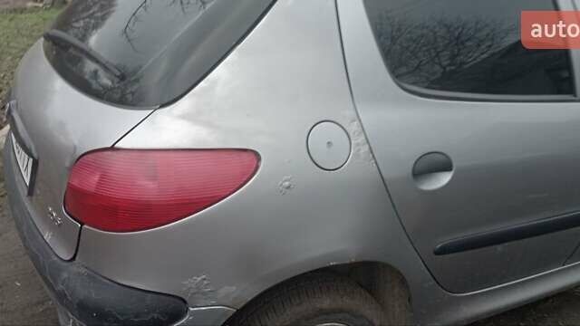 Сірий Пежо 206, об'ємом двигуна 1.4 л та пробігом 210 тис. км за 3200 $, фото 6 на Automoto.ua