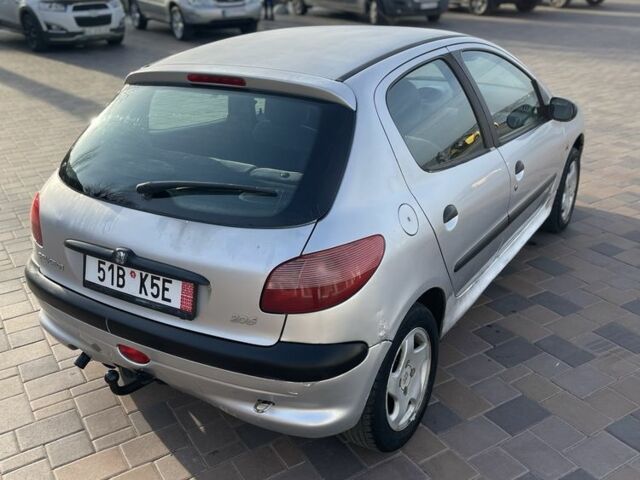 Серый Пежо 206, объемом двигателя 1.9 л и пробегом 200 тыс. км за 1299 $, фото 17 на Automoto.ua