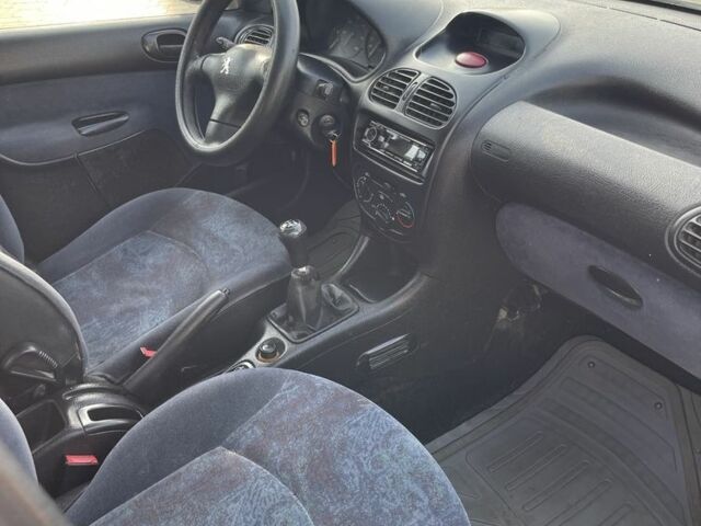 Серый Пежо 206, объемом двигателя 1.9 л и пробегом 200 тыс. км за 1299 $, фото 8 на Automoto.ua