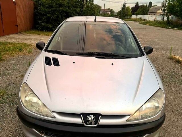 Сірий Пежо 206, об'ємом двигуна 1.9 л та пробігом 204 тис. км за 2000 $, фото 4 на Automoto.ua