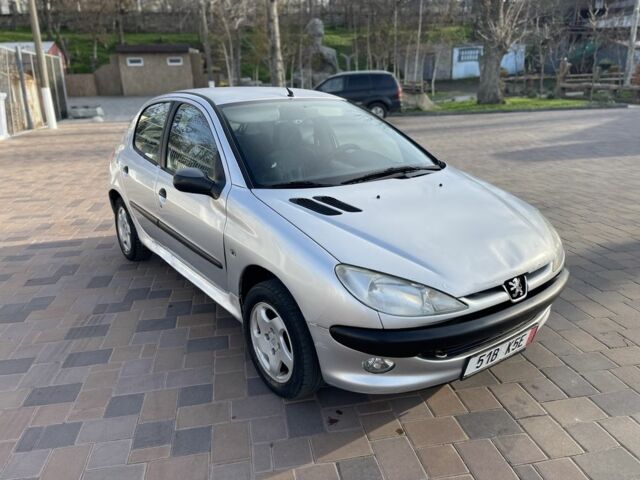 Серый Пежо 206, объемом двигателя 1.9 л и пробегом 200 тыс. км за 1299 $, фото 4 на Automoto.ua