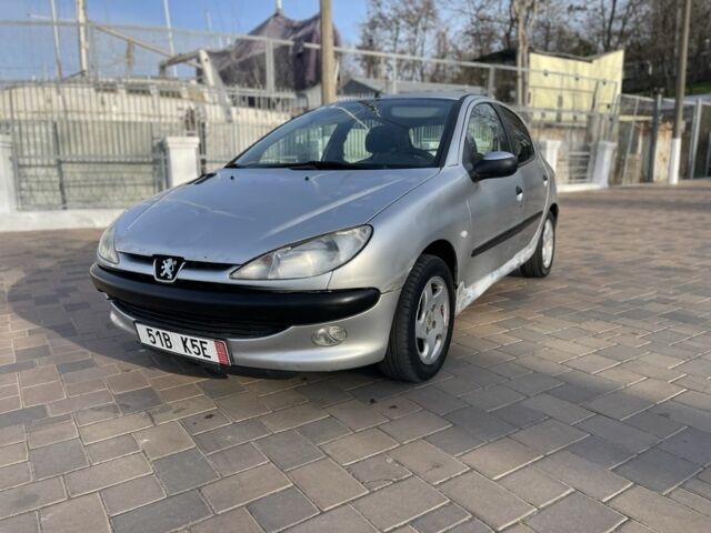 Серый Пежо 206, объемом двигателя 1.9 л и пробегом 200 тыс. км за 1299 $, фото 6 на Automoto.ua