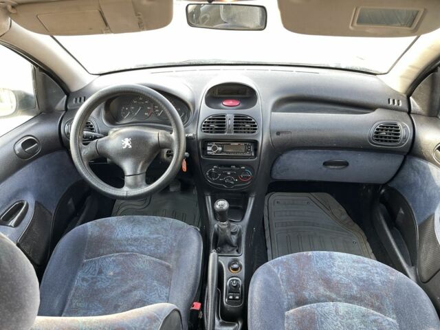 Серый Пежо 206, объемом двигателя 1.9 л и пробегом 200 тыс. км за 1299 $, фото 9 на Automoto.ua