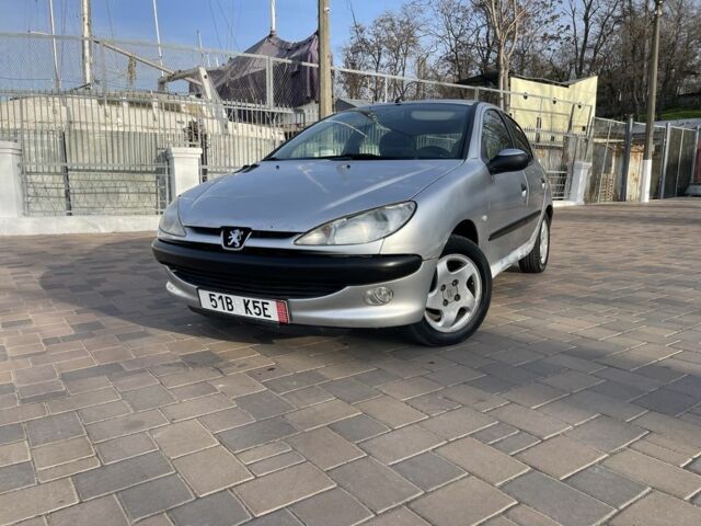 Серый Пежо 206, объемом двигателя 1.9 л и пробегом 200 тыс. км за 1299 $, фото 2 на Automoto.ua