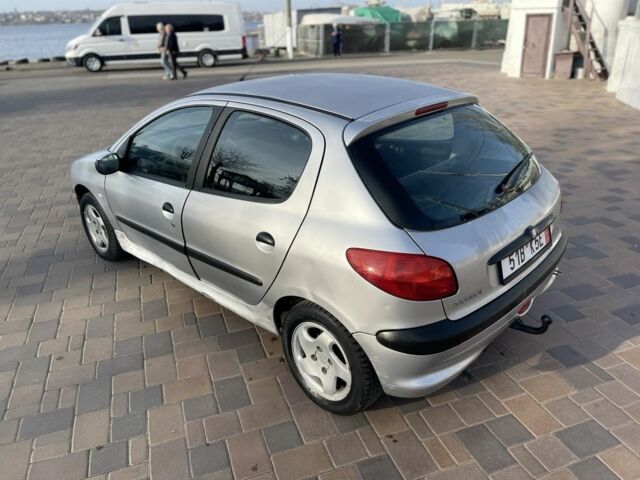 Серый Пежо 206, объемом двигателя 1.9 л и пробегом 200 тыс. км за 1299 $, фото 3 на Automoto.ua