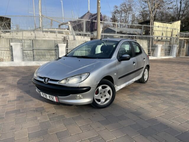Серый Пежо 206, объемом двигателя 1.9 л и пробегом 200 тыс. км за 1299 $, фото 1 на Automoto.ua