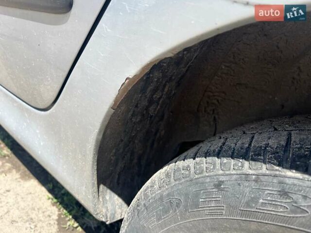 Серый Пежо 206, объемом двигателя 1.36 л и пробегом 300 тыс. км за 2000 $, фото 5 на Automoto.ua