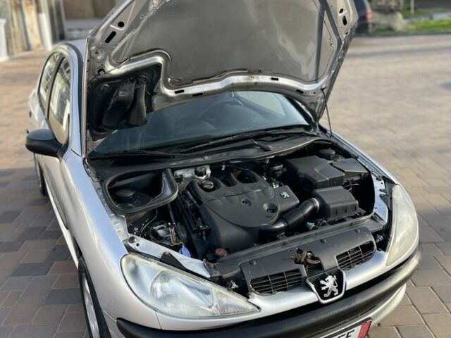 Серый Пежо 206, объемом двигателя 1.9 л и пробегом 200 тыс. км за 1299 $, фото 12 на Automoto.ua
