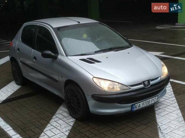 Сірий Пежо 206, об'ємом двигуна 1.36 л та пробігом 340 тис. км за 2950 $, фото 8 на Automoto.ua