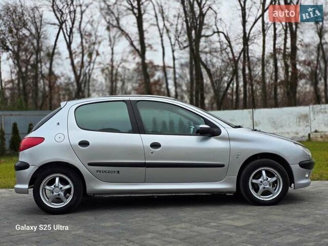 Серый Пежо 206, объемом двигателя 1.4 л и пробегом 221 тыс. км за 2450 $, фото 8 на Automoto.ua