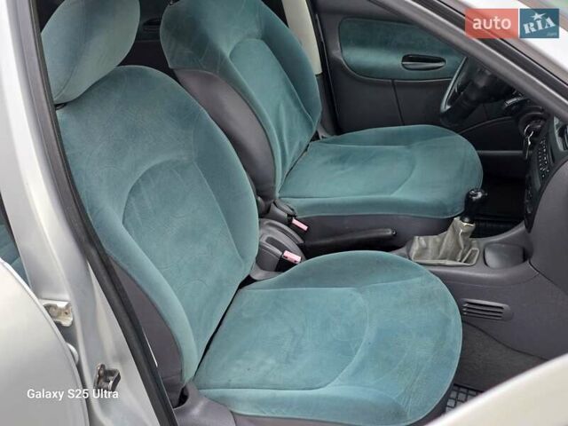 Серый Пежо 206, объемом двигателя 1.4 л и пробегом 221 тыс. км за 2450 $, фото 23 на Automoto.ua