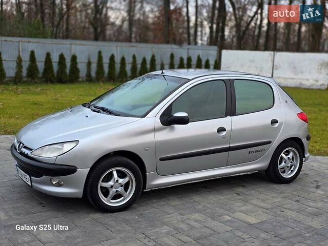 Серый Пежо 206, объемом двигателя 1.4 л и пробегом 221 тыс. км за 2450 $, фото 28 на Automoto.ua