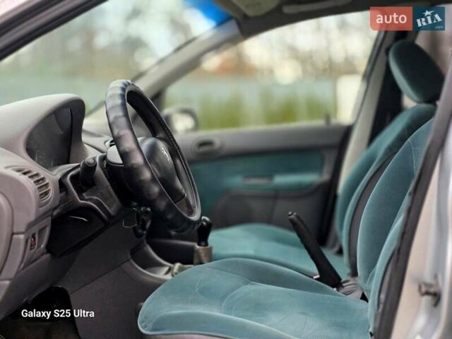 Серый Пежо 206, объемом двигателя 1.4 л и пробегом 221 тыс. км за 2450 $, фото 45 на Automoto.ua