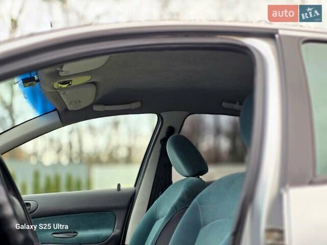 Серый Пежо 206, объемом двигателя 1.4 л и пробегом 221 тыс. км за 2450 $, фото 44 на Automoto.ua