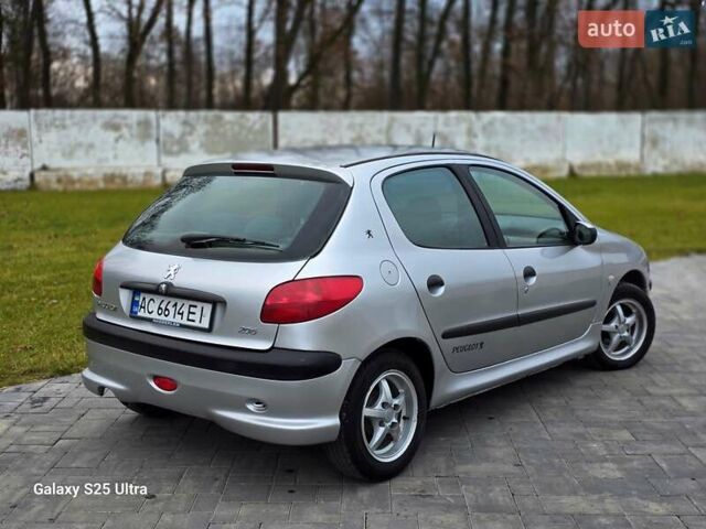 Серый Пежо 206, объемом двигателя 1.4 л и пробегом 221 тыс. км за 2450 $, фото 11 на Automoto.ua