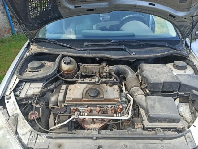 Серый Пежо 206, объемом двигателя 1.4 л и пробегом 250 тыс. км за 1000 $, фото 3 на Automoto.ua