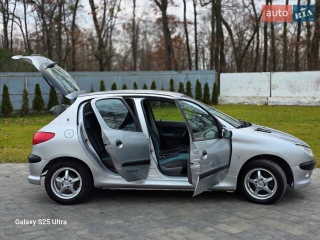 Серый Пежо 206, объемом двигателя 1.4 л и пробегом 221 тыс. км за 2450 $, фото 17 на Automoto.ua