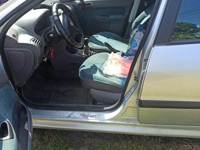 Серый Пежо 206, объемом двигателя 1.4 л и пробегом 250 тыс. км за 1000 $, фото 2 на Automoto.ua