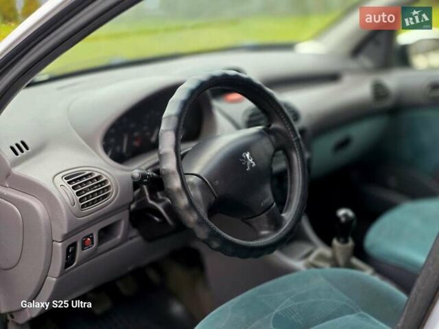 Серый Пежо 206, объемом двигателя 1.4 л и пробегом 221 тыс. км за 2450 $, фото 43 на Automoto.ua