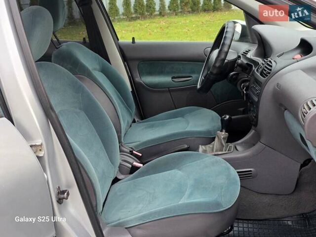 Серый Пежо 206, объемом двигателя 1.4 л и пробегом 221 тыс. км за 2450 $, фото 22 на Automoto.ua