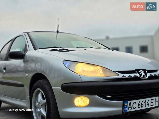 Серый Пежо 206, объемом двигателя 1.4 л и пробегом 221 тыс. км за 2450 $, фото 30 на Automoto.ua