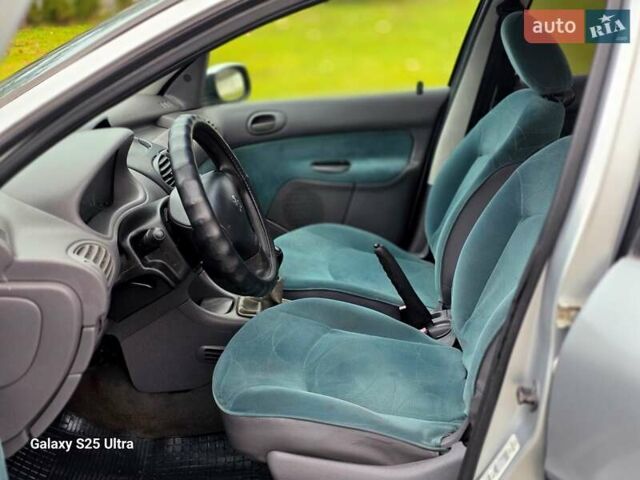 Серый Пежо 206, объемом двигателя 1.4 л и пробегом 221 тыс. км за 2450 $, фото 39 на Automoto.ua