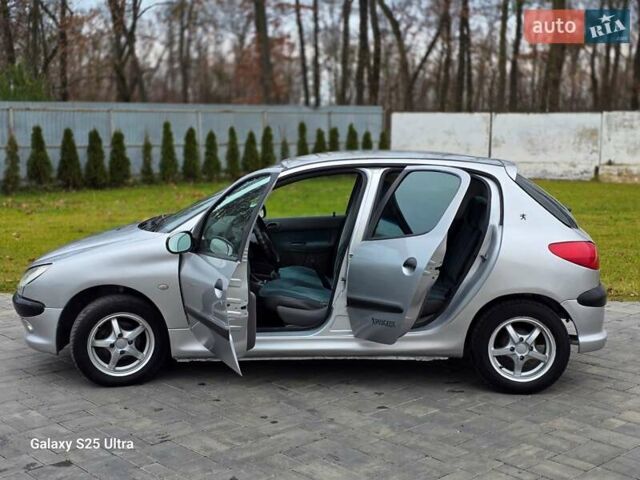 Серый Пежо 206, объемом двигателя 1.4 л и пробегом 221 тыс. км за 2450 $, фото 35 на Automoto.ua
