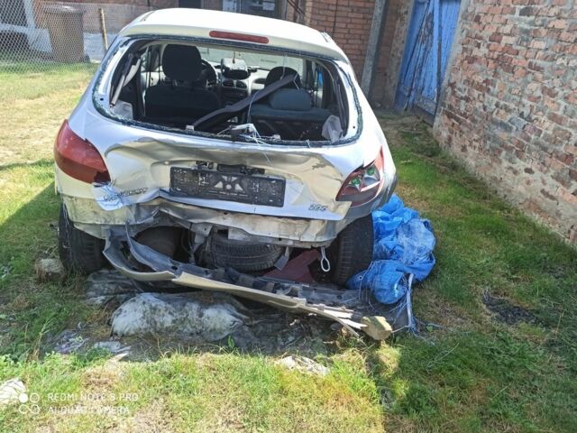 Серый Пежо 206, объемом двигателя 1.4 л и пробегом 250 тыс. км за 1000 $, фото 4 на Automoto.ua