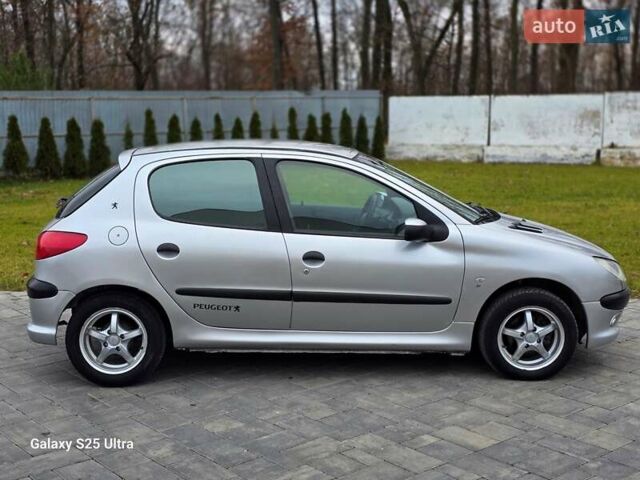 Серый Пежо 206, объемом двигателя 1.4 л и пробегом 221 тыс. км за 2450 $, фото 7 на Automoto.ua
