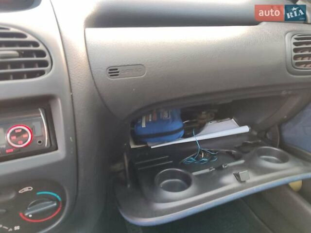 Серый Пежо 206, объемом двигателя 1.12 л и пробегом 154 тыс. км за 2900 $, фото 14 на Automoto.ua