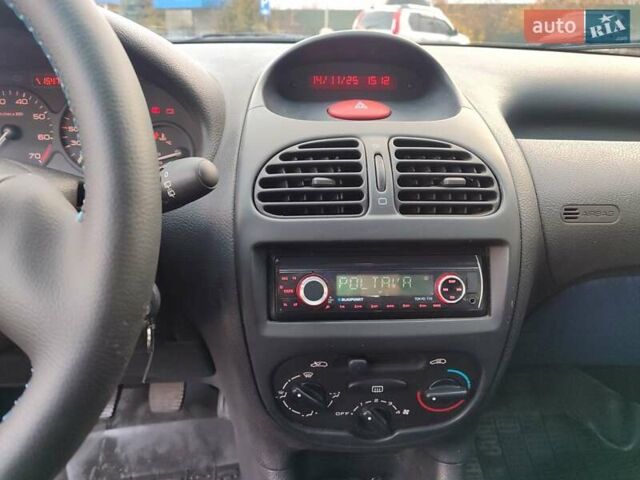 Серый Пежо 206, объемом двигателя 1.12 л и пробегом 154 тыс. км за 2900 $, фото 13 на Automoto.ua
