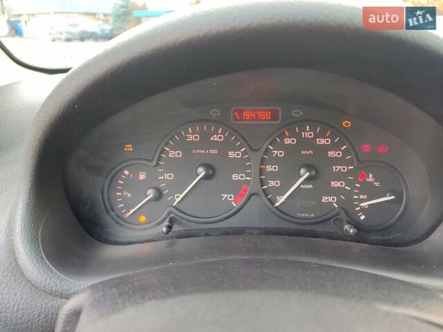 Серый Пежо 206, объемом двигателя 1.12 л и пробегом 154 тыс. км за 2900 $, фото 12 на Automoto.ua