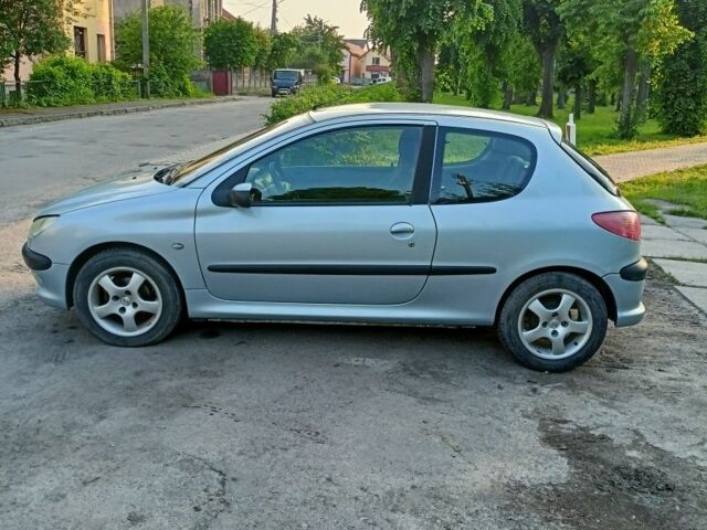Сірий Пежо 206, об'ємом двигуна 1.4 л та пробігом 200 тис. км за 2399 $, фото 11 на Automoto.ua